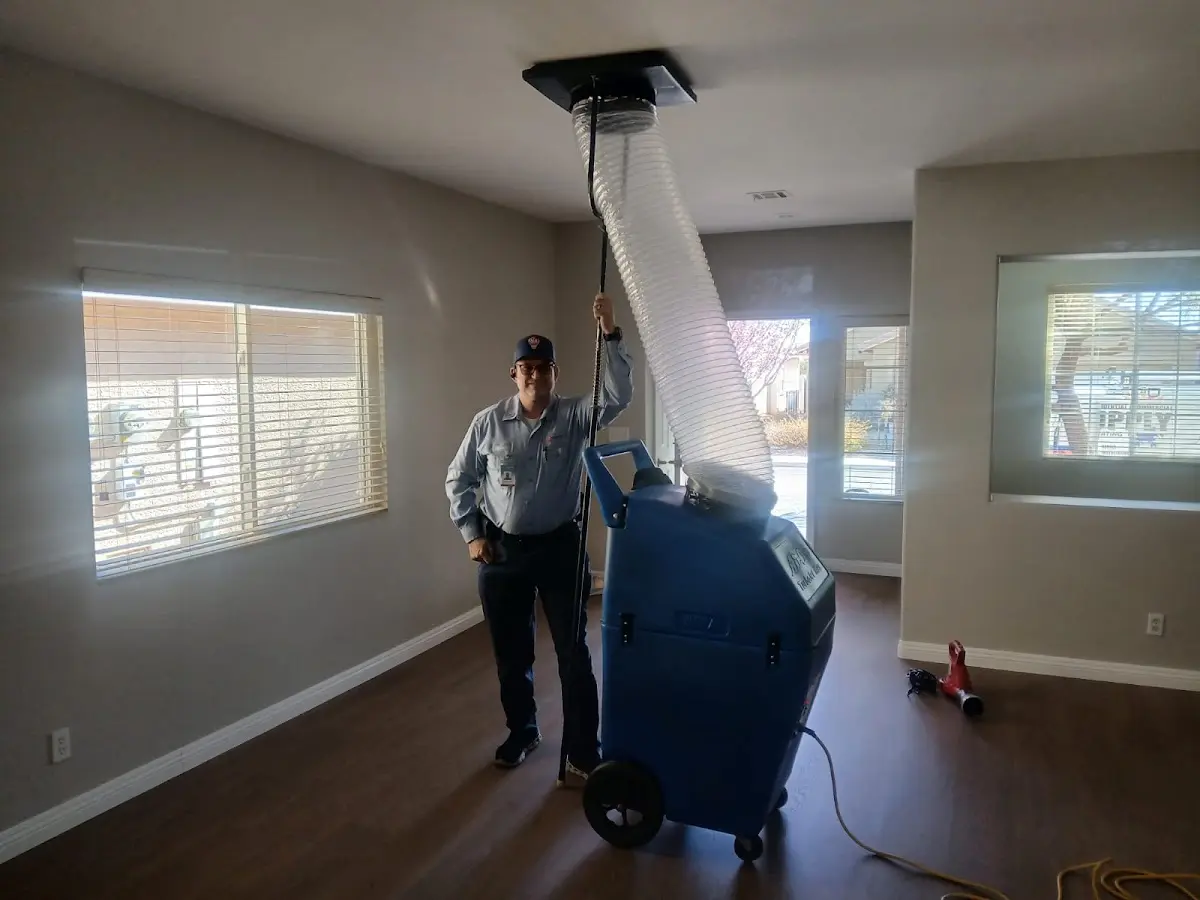 Professional Dryer Vent Cleaning work inside a Pueblo West home